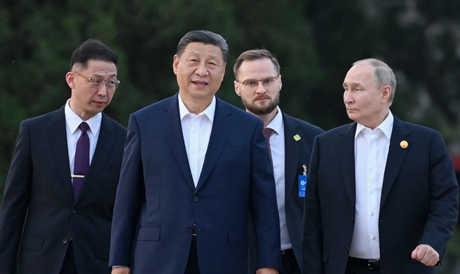 俄罗斯总统普丁16日访中进行国是会议。（图／新华社）