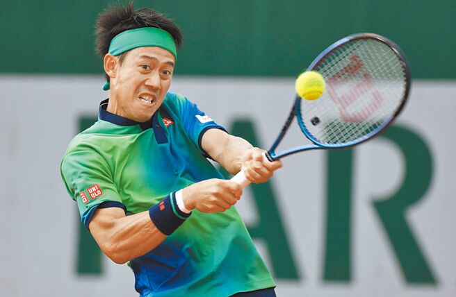 锦织圭拿到相隔997天的四大赛单打会内赛胜利。（路透）