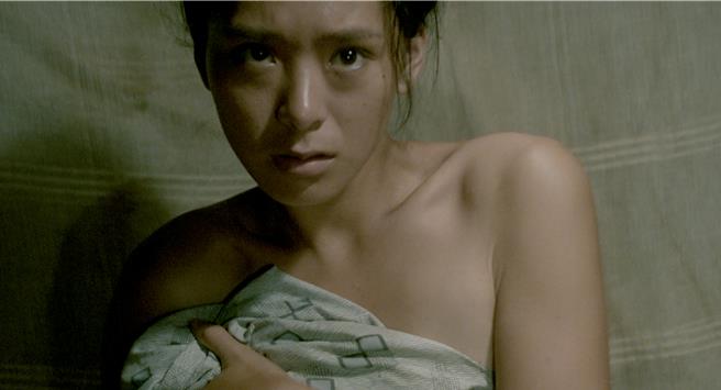 香港演员夏文汐在《杀夫》片中饰演村妇林市。（国家影视听中心提供）