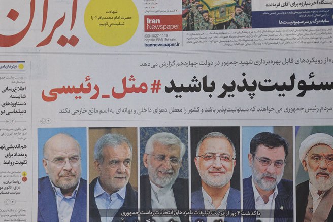 年轻伊朗人的政治观点仍存在分歧，反映出的裂痕恐将左右28日总统大选的结果。(路透社)