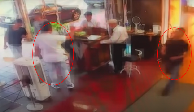 枪手伏击「威震」吴明达后，到派出所投案，并声称咖啡厅遭到吴的小弟收保护费，因此心生不满。（图／翻摄画面）