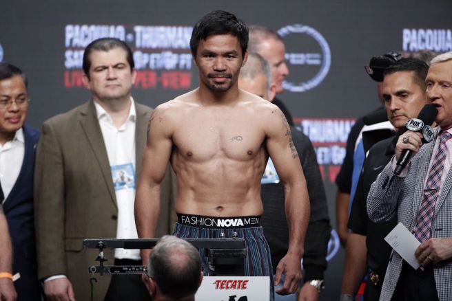 45岁的菲律宾传奇拳王帕奎奥想打巴黎奥运，但国际奥会拒绝调高年龄上限。（美联社资料照）