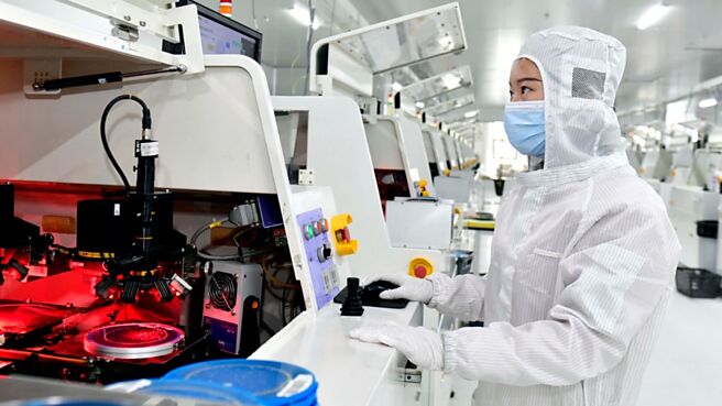 大陸記憶體廠商上半年繳出亮眼成績單，四家獲利年增率估超過50％。圖／新華社