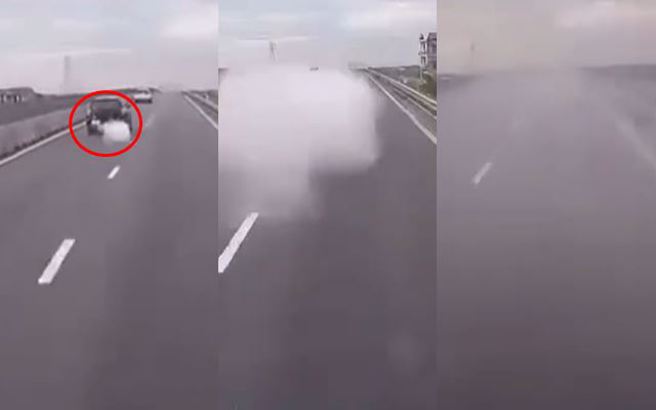 國外有駕駛行駛在快速道路時，發現前方休旅車冒出一陣白煙後，車子竟消失無蹤了。（圖／翻攝自臉書八卦村 - 行車紀錄器影片上傳中心）
