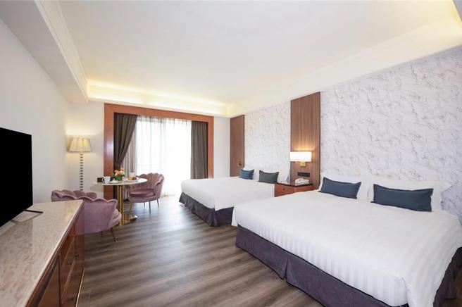 台北漢普頓酒店推出「大稻埕夏日節煙火」住房專案，四人入住含4客早餐5999元起。圖／台北漢普頓酒店提供