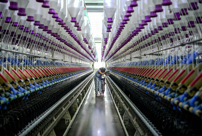 纺织业受惠台币贬值。图／新华社