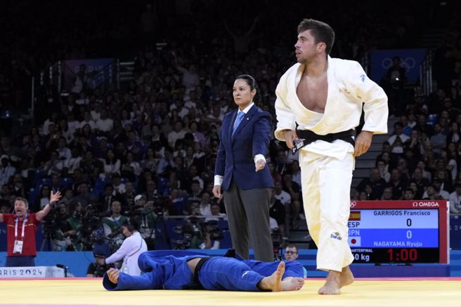 西班牙加瑞戈斯在8強賽勒昏永山龍樹。（美聯社資料照）