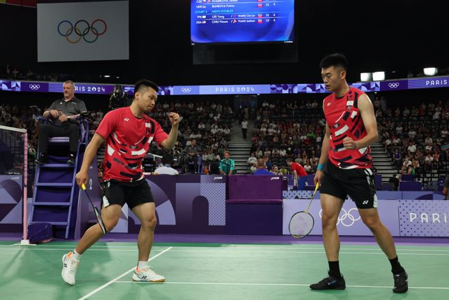 李洋（左）、王齊麟以直落2輕取美國對手，拿下預賽3連勝。（杜宜諳攝）