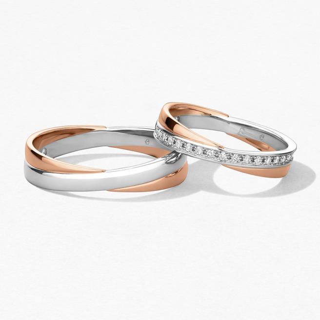 Hearts On Fire的Embrace對戒，以鉑金與玫瑰金交錯纏繞詮釋愛情，4萬3000元、4萬9000元 。（Hearts On Fire提供）