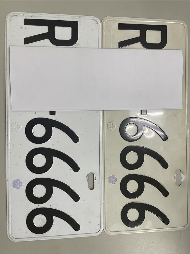 紅色保時捷跑車懸掛偽車牌，遭警方查扣。（國九隊提供／吳佩蓉宜蘭傳真）