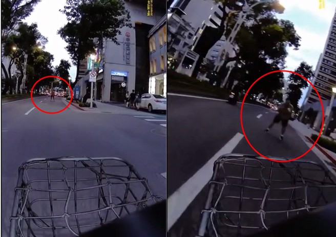 一名骑士在台北市中山北路一段，遇到一名「台版浩克」，站路中大喊「撞我」，实在令人傻眼。（翻摄爆料公社）