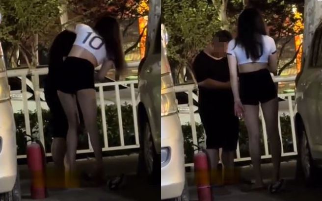 大陆有长腿妹子不明原因，狂对男子赏32巴掌，而男子却一句话都不敢吭。（图／翻摄自微博）