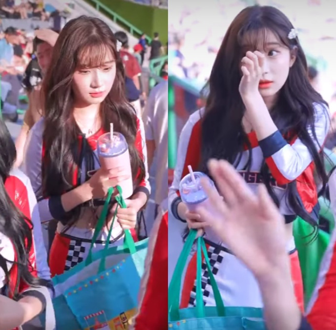 李珠珢被拍到前往应援路上，总是提着大袋子，头低低的走在最后方，疑似饱受委屈。（图／Jing Jing脸书）