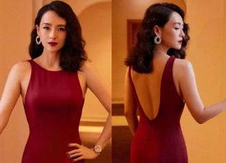 章子怡不理汪峰婚内外遇丑闻　性感裸背礼服现身威尼斯