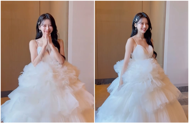 啦啦队女神李雅英（이아영）7日在社群分享自己为了活动而穿上的婚纱礼服。（图／摄自 yyyoungggggg IG）