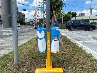 废弃灭火器变身企鹅 员林清洁队制创意熄菸筒超吸睛