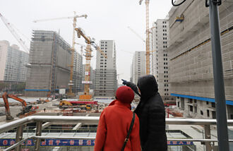 救房市 滬深傳取消限購令