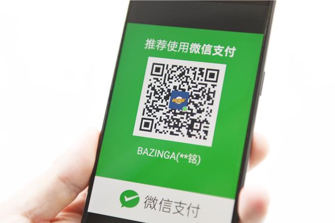 面对27日起淘宝能用微信进行支付等跨平台对接「破圈」，也帮助大陆建构全国统一大市场。（示意图:shutterstock/达志）
