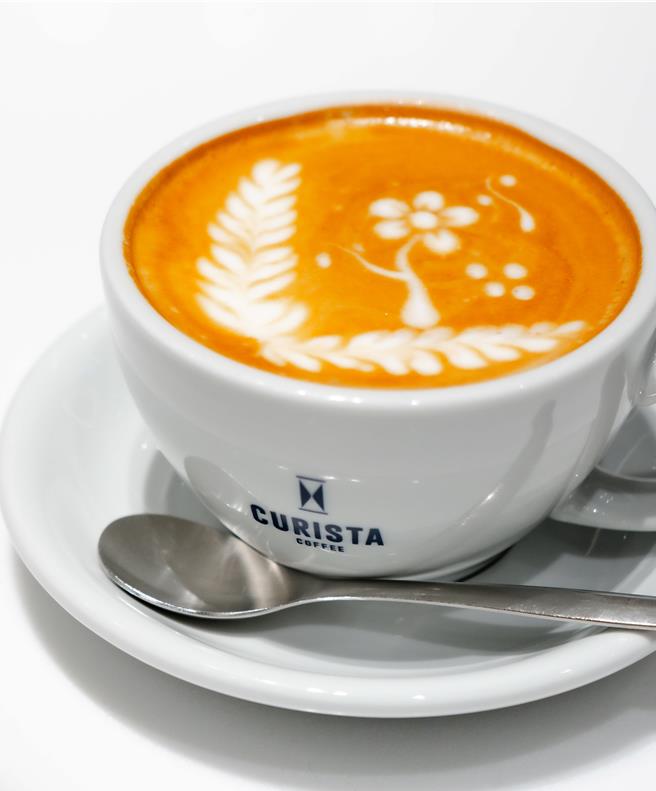专属于台湾人的咖啡「台湾拿铁」，严选来自衣索比亚中烘焙义式配方豆的咖啡拿铁，搭配国民饮料冬瓜茶，展现台湾自身风土滋味。(奎士咖啡提供)