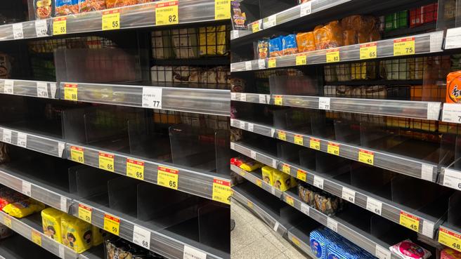 颱風來襲，許多民眾趕緊到賣場採買泡麵，不少品項都被掃光。（示意圖／朱世凱攝）