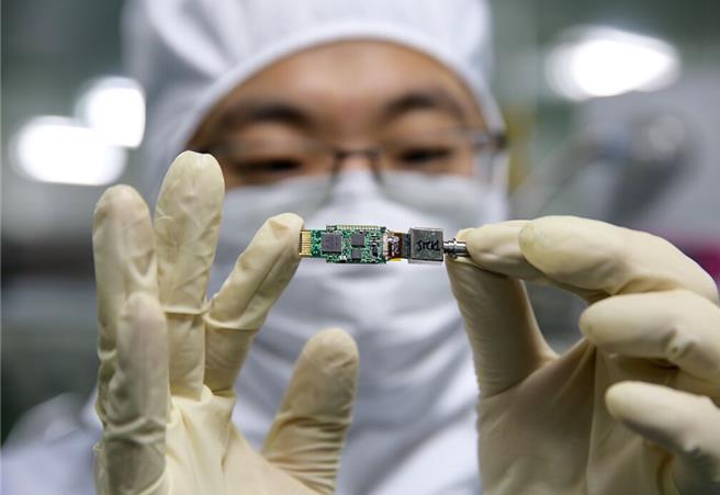 大陸工信部長金壯龍表示，要抓緊打造自主可控的產業鏈、供應鏈。（新華社資料照）