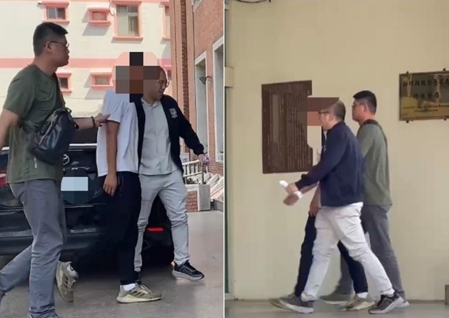 砸店的2名男子被警方带回侦询。（翻摄画面）