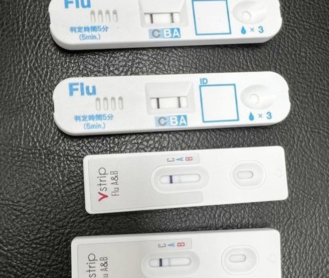 李典宪医师在昨天早上的门诊，快筛出4名A流的病人。（图／李典宪医师授权提供）