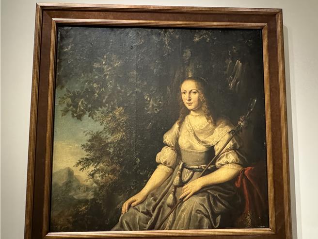 〈裝扮為牧羊女的女子肖像〉經科學檢測發現女子面部被後人修改成為今貌。（曹婷婷攝）