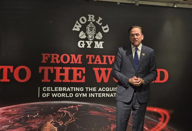 世界健身董事長暨總經理柯約翰宣布，成功收購World Gym品牌美國母公司。（黃琮淵攝）