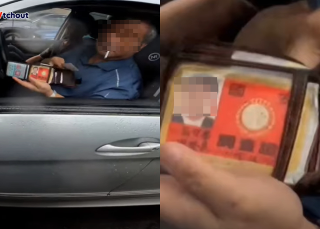 叼着菸的男驾驶不仅没繫安全带，还从口袋掏出钱包秀出「国安调查证」。（翻摄自WoWtchout - 地图型行车影像分享平台）