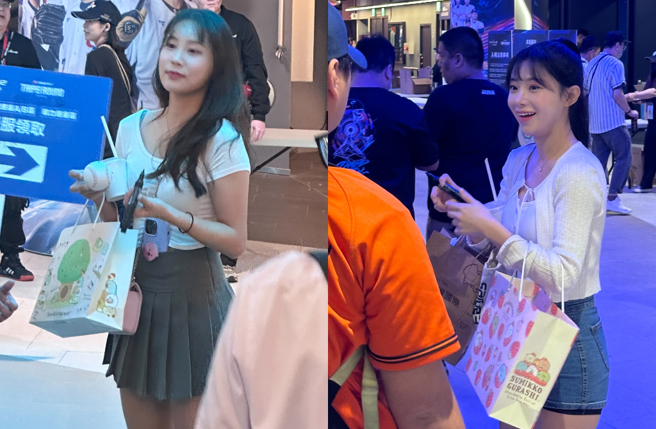 朴宣柱（左）、金娜妍现身台北大巨蛋被野生捕获。（图／詹镒睿摄）