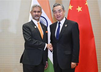 王毅晤印外长 商讨重启直航、互派记者等合作