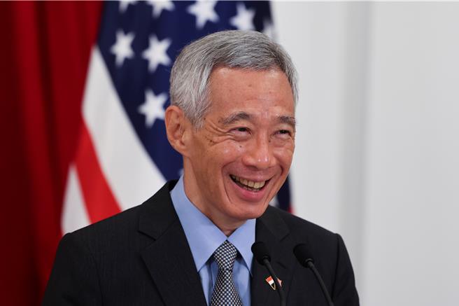 李顯龍去年在人民行動黨代表大會上表示，他將在今年的大會上，將黨的領導權移交給黃循財，而今年也是人民行動黨成立70週年。（路透社）