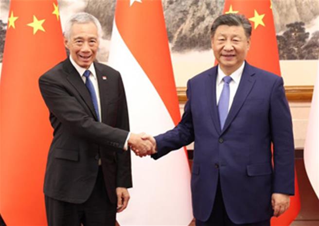 習近平會見李顯龍，雙方將加強戰略對接，參與中國式現代化進程。（新華社）