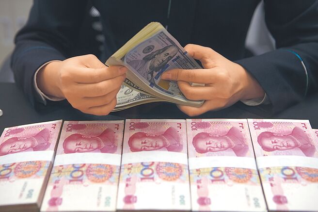 人民币重回全球第四大活跃支付货币的地位。图／中新社