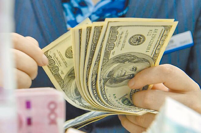 美元。圖／新華社