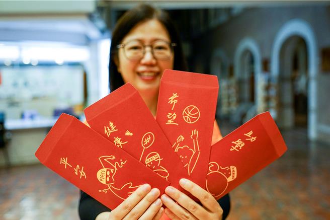 台灣世界展望會舉辦「紅包傳愛」，設計平安、健康、希望、助學的紅包，期盼能將4種祝福傳達給弱勢兒少。（李忠一攝）