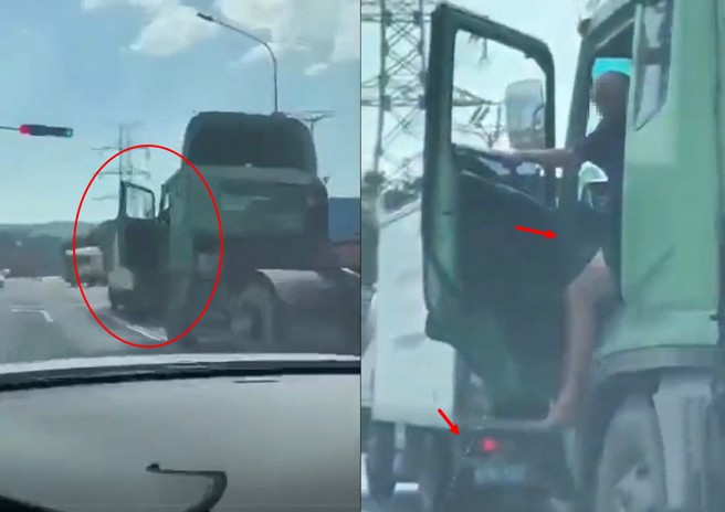 網路流傳一名大貨車司機，停等紅燈時尿急，直接大開車門放水。（翻攝爆料公社）
