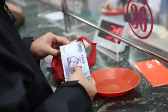 時論廣場》不分顏色 看緊荷包（黃丙喜）