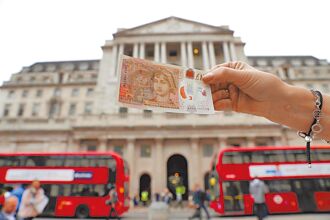 BOE降息1碼 英鎊重貶