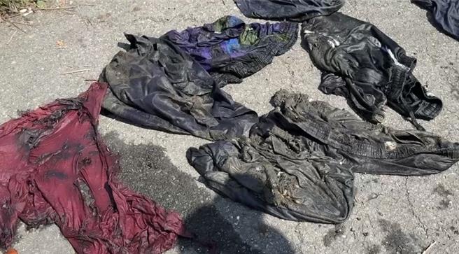 尸块打捞到的衣物，左下的红色衣服有烧灼痕迹。（民眾提供／郭良杰高雄传真）