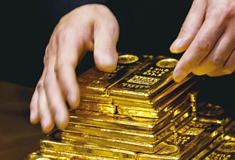 金价上冲下洗 战新高仍在望