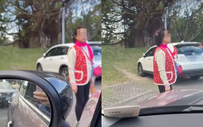 有女驾驶遇妇人「人肉占位」，对方还左摇右晃不听劝，让她相当无奈。（图／翻摄自脸书爆废公社公开版）
