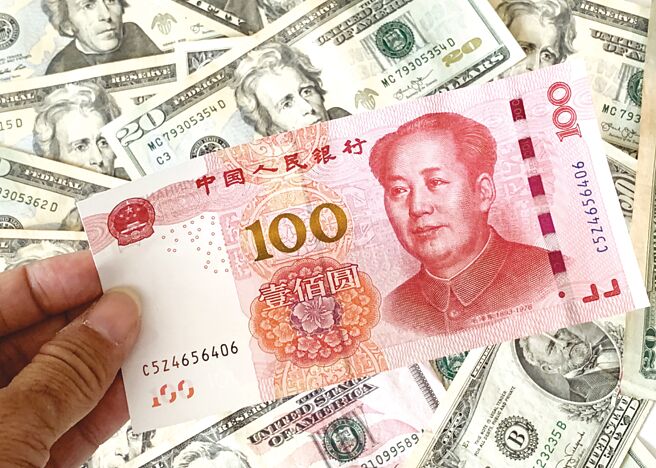 中国人民银行行长潘功胜表示，稳定的人民币匯率是全球金融和经济稳定的关键。图／中新社