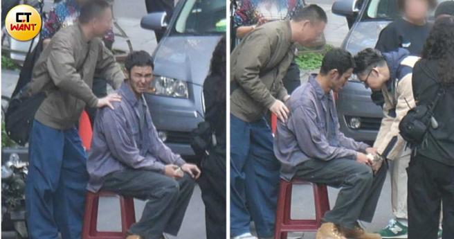 助理帮忙按摩，阮经天露出痛苦表情，连导演都弯着身子在阮经天的左腿和膝盖区域帮忙按摩并陪他讲话。（图／本刊摄影组）