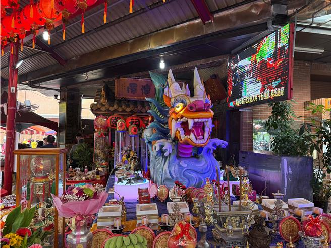 「巨龙吞日」景象，象徵事业蒸蒸日上、财富源源不绝。（何欣纯服务处提供／李京升台中传真）