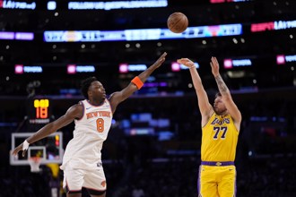 NBA》詹姆斯、东契奇得分都破30 湖人惊险延长气走尼克