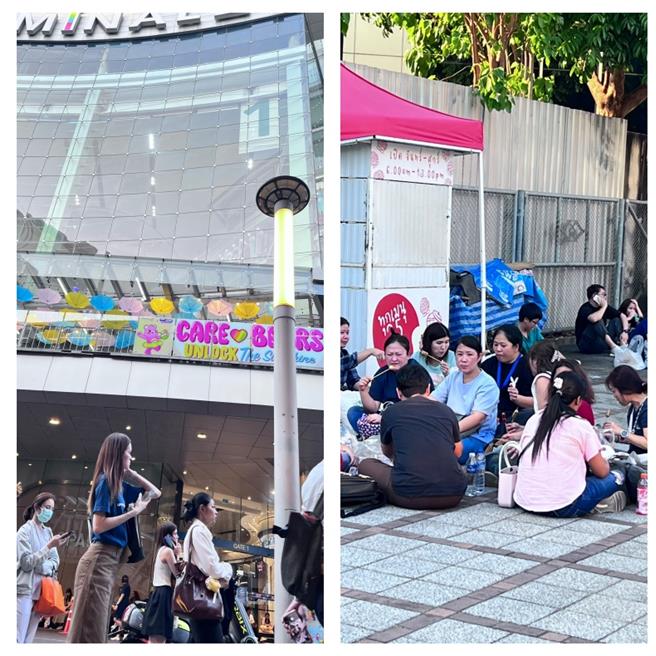 昨午地震发生后，曼谷的百货公司紧急关闭，有民眾席地而坐等车。（朱正生提供）