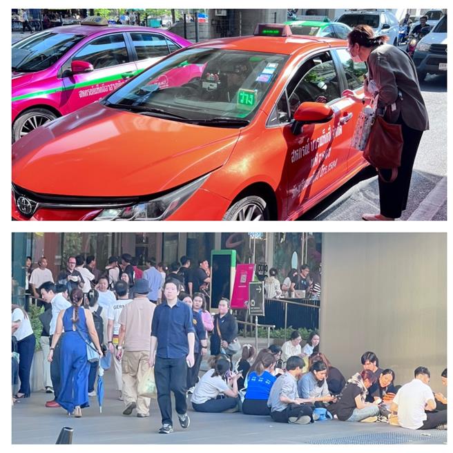 曼谷昨午各个交通口都挤满人潮，计程车也很难搭得到。（朱正生提供）