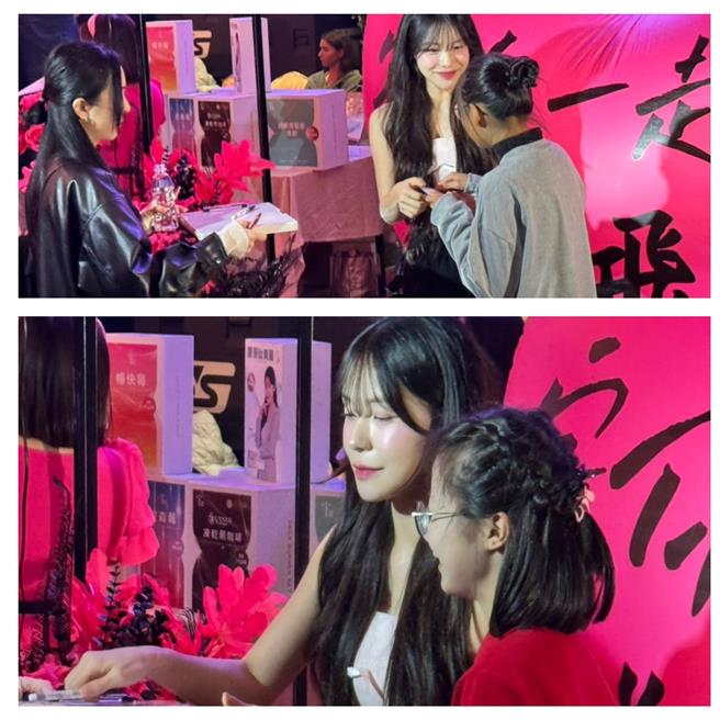 李多慧在现场帮年轻小粉丝签名和合照。（洪秀瑛摄）